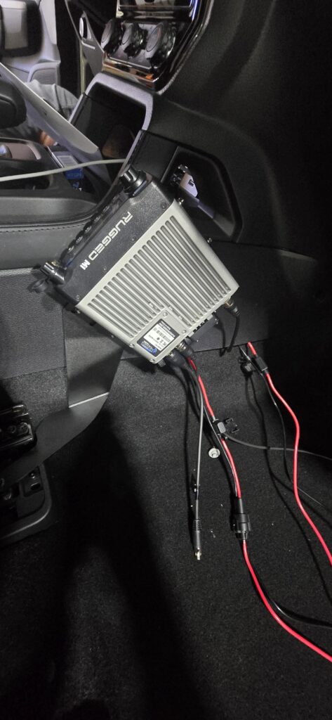 Rugged M1 radio getting installed in a Ranger Raptor