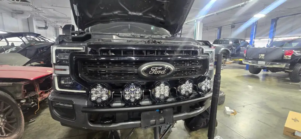 Ford F-250 light bar and Baja Designs LP6 lighting installation